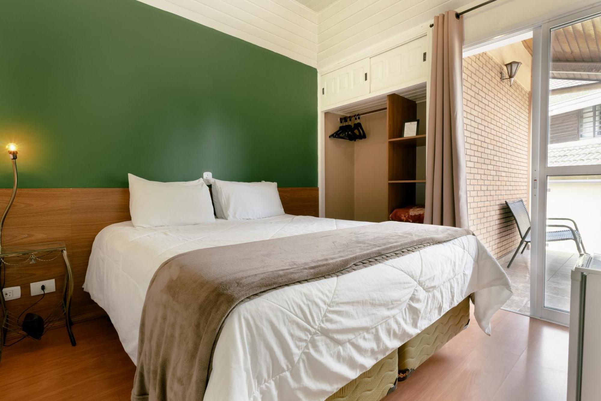 Hotel Geneve - 2Km Do Capivari Кампус-ду-Жордау Экстерьер фото
